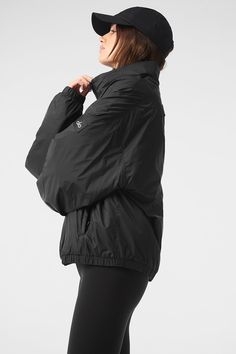 Running to your workout in the rain? Reach for the Latitude Pullover. It’s lightly filled (for a touch of warmth) with functional details like a half-zip collar, zippered side pockets, banded cuffs and a banded hem. Fitwise, it’s generous and oversized. And it’s made from 100 percent nylon—the kind that’s durable, swishy and ready to face the elements. Black Half-zip Windbreaker For Outdoor Activities, Black Half-zip Track Jacket For Outdoor, Black Half-zip Techwear Windbreaker, Black Nylon Half-zip Windbreaker, Black Functional Half-zip Outerwear, Black Waterproof Windbreaker In Athleisure Style, Black Nylon Half-zip Track Jacket, Black Stretch Track Jacket For Outdoor Activities, Black Half-zip Nylon Track Jacket