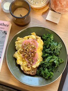 an omelet and some greens on a plate