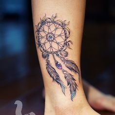 an image of a tattoo that is on someone's leg