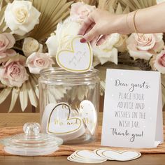 PRICES MAY VARY. WISH JAR AND ADVICE CARDS - Gglass cookie jar-style jar with lid; jar features gold foil text that reads " Wishes for the new Mr & Mrs" in a gold swirly flourish; set comes with white heart-shaped cardstock cards with gold foil border. PERFECT KEEPSAKE - Made from a thick and sturdy cardstock, these advice cards are something you can hold onto, create a book, poster or store them in your wish jar! FUN - Everyone loves to share their stories and advice, make sure you capture thos Wedding Advice Jar, Advice Jar, Wish Jar, Aspen Wedding, Wedding Guest Book Alternative, Guest Book Alternative, Engagement Party Decorations, Drop Box, Shaped Cards