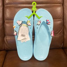 Brand New Crocs Classic Women's Hello Kitty Flip Flop Sandals Size: 9 Color: Light Blue Crocs Flip Flops Woman, Cute Non-slip Flat Flip Flops, Playful Blue Adjustable Sandals, Fun Open Toe Synthetic Flip Flops, Playful Adjustable Blue Sandals, Fun Synthetic Open Toe Flip Flops, Cute Blue Round Toe Sandals, Light Blue Casual Flip Flops For Spring, Casual Light Blue Spring Flip Flops