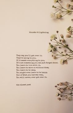 flowers are placed next to a poem written by someone