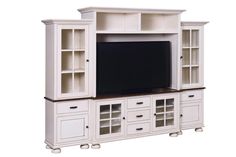 a white entertainment center with glass doors and drawers