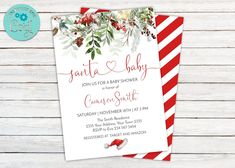 a red and white striped christmas themed baby shower with holly wreaths on the front