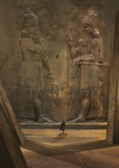 an egyptian scene with two statues and a man