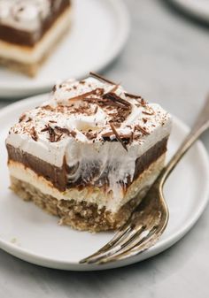 a piece of cake on a plate with a fork