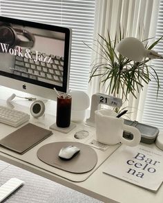 a desktop computer sitting on top of a white desk