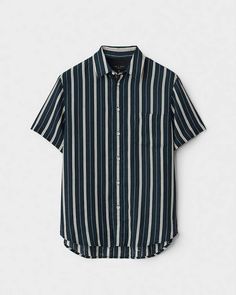 Crafted from 100% cotton, Gus is a relaxed fit button down with front pocket, metal buttons down the center front and Italian twill details. rag & bone Men's Classic Fit Button Down Shirt | Navy Stripe, 2XL (also in S). Fall Shirt With Rolled Sleeves For Casual Gatherings, Casual Tops With Buttoned Pockets, Casual Tops With Buttoned Pockets For Gatherings, Casual Button-up Shirt With Button Closure, Button-up Shirt For Casual Gatherings, Classic Cotton Shirt With Buttoned Pockets, Classic Shirt With Buttoned Pockets For Casual Gatherings, Summer Button-up Shirt With Welt Pockets, Summer Button-up Shirt With Button Cuffs