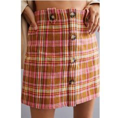 Maeve By Anthropologie Button-Front Mini Skirt In Pink Combo Plaid. Sold Out Everywhere. Size Women's Medium. Condition Is Brand New With Tags. Features: Side Zip Multi-Color Plaid Button Details Cotton, Polyester, Elastane, Viscose Hand Wash I Have Many Other Unique Anthropologie Items Available. Take Advantage Of Flat Rate Shipping (No Added Shipping Costs When Adding Additional Items To Your Cart) - Just Click On The "Add To Bundle" Button On Each Listing. New To Poshmark? Get $10 Poshmark Cr Retro Mini Skirt With Button Closure For Spring, Pink Bottoms With Buttons For Fall, Trendy Yellow Mini Skirt For Fall, Yellow Skirt For Day Out In Fall, Pink Fall Bottoms With Buttons, Mini Skirt With Button Closure For Fall, Yellow Skirt For Fall Day Out, Yellow Fall Skirt For Day Out, Preppy Yellow Bottoms For Spring