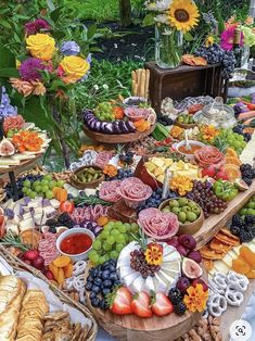 a table filled with lots of different types of food