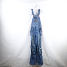 Vintage 50s 60s Womens 26 Thrashed Sanforized Cotton Flared Denim Overalls USA Womens Overalls Thrashed. Distressed and faded. Has stains all over. USA made Womens 26 Measurements are: 13.5 inches across the waist 34 inch inseam 61.5 inches from top to bottom 9.75 inch leg opening Blue Cotton US Shipping is FREE Canada is $15 and International is $24 Check out my other items in my store! I272 Vintage Style Full Length Cotton Overalls, Vintage Fitted Overalls For Spring, Fitted Vintage Overalls For Spring, Spring Vintage High Waist Overalls, Vintage Denim Blue Jean Overalls, Vintage High Waist Cotton Overalls, Fitted Retro Overalls, Vintage Spring Overalls, Fitted Medium Wash Cotton Overalls