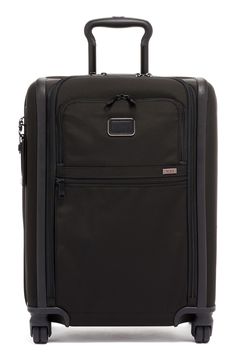 Supremely durable tech construction means lasting appeal for this smart packing case ideal for weekend getaways or short business trips. The style comes with a removable garment bag that holds one suit, and offers an array of pockets for added utility. Swiveling, easy-to-maneuver wheels offer multidirectional navigation, while smart bumper guards and a patented impact-resistant, X-Brace telescoping handle system complete the virtually damage-proof design. Tumi's Lever-Lock Expansion system opens Smart Packing, Garment Bag, Battery Pack, Panel Siding, Carry On, Women's Accessories, Nordstrom, Design