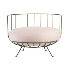 a round metal chair with a pink cushion on the seat and backrest, against a white background