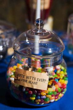 a glass jar filled with lots of candy