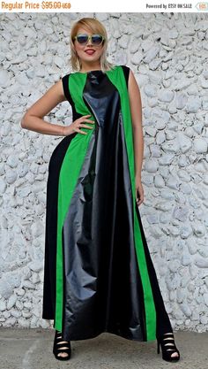 GREEN SALE 35% OFF Long Flared Black and Green Maxi Dress https://www.etsy.com/listing/502399920/green-sale-35-off-long-flared-black-and?utm_campaign=crowdfire&utm_content=crowdfire&utm_medium=social&utm_source=pinterest?utm_campaign=crowdfire&utm_content=crowdfire&utm_medium=social&utm_source=pinterest https://www.etsy.com/listing/502399920/green-sale-35-off-long-flared-black-and Green Sleeveless Maxi Dress For Party, Green Maxi Length Sleeveless Dress For Party, Black Sleeveless Retro Dress, Trendy Black Sleeveless Dress, Retro Black Sleeveless Dress, Green A-line Maxi Dress For Night Out, Black Retro Sleeveless Dress, Black Retro Party Dress, Retro Black Party Dress