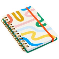 a spiral bound notebook with an orange ribbon on the front and colorful swirls on the inside