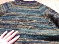 Vintage multicolor green/ black sweater, hand-knitted from mixed woolen yarn, nice and warm sweater. Ideal everyday wear for use in autumn/ winter. ladies Size: overs-sized Medium measured flat: total length 72 cm (28.3464567 inches) armpit to armpit 52 cm ( 20.4724409 inches) sleeve from collar 70 cm (27.5590551 inches) Condition: very good vintage condition. Ready to wear. Please read my shop policies before purchase! Green Knitted Crew Neck Cardigan, Green Fair Isle Sweater For Fall, Green Wool Knitted Cardigan, Black Wool Hand Knitted Sweater, Cozy Hand Knitted Green Sweater, Cozy Hand-knitted Green Sweater, Cozy Green Fair Isle Sweater, Cozy Green Knitting Pattern, Hand Knitted Green Knitting Pattern