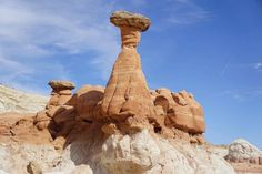 a rock formation in the middle of a desert