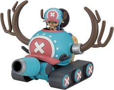 a toy car with antlers on it and a man in a helmet sitting on top