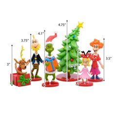 the grinch family figurines are next to each other in front of a christmas tree