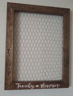 a chicken wire frame hanging on the wall