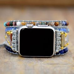 Boho Beaded Apple Watch Band Wrap Dress up your tech with this unique Apple Watch bracelet! Our wrap-around watchband is beautifully handcrafted using high-quality natural Lapis lazuli and jasper stones loomed on a natural cord. It comes with an adjustable closure to fit most wrist sizes. Refresh your smartwatch with these special beaded straps. Our boho watch strap is the perfect gift for yourself, the independent, or the free-spirited. And of course, get the benefits of the natural stones whil Handmade Watch Bands, Apple Watch Bracelets, Handmade Watch, Tiger Eye Jewelry, Rose Quartz Jewelry, Cord Wrap, Bracelet Apple Watch, Apple Watch Faces, Smart Watches