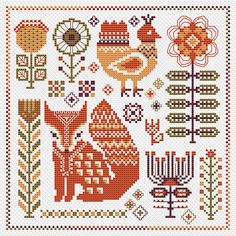 a cross stitch pattern with animals and flowers on it's side, including an orange flower