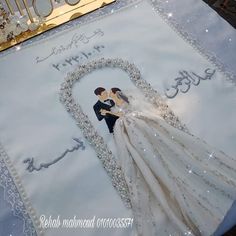 a wedding cake with a bride and groom on it