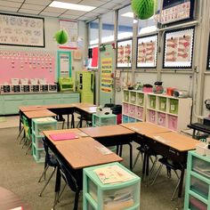 an empty classroom with many desks and chairs