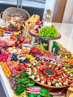 a table topped with lots of different types of food