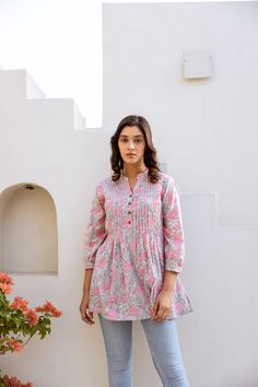 🌷  MONSOON LOTUS Add a splash of colour to your wardrobe with our Monsoon Lotus in vibrating floral motifs. Monsoon Lotus was created for a comfortable loose fit, and decorated with traditional hand block prints. Sizings: Size S:   Shoulders 38cm - 14.9" Bust  92cm - 36.2" Length approx. 72cm - 28.3" Size M:   Shoulders 40cm - 15.7" Bust  102cm - 40.1" Length approx. 72cm - 28.3" Size L:   Shoulders 42cm - 16.5" Bust  108cm - 42.5" Length approx. 72cm - 28.3" Size XL: Shoulders 43cm - 16.9" Bus Summer Tunic Tops With Printed Motifs, Summer Tunic Blouse With Printed Motifs, Casual Tunic Blouse With Printed Motifs, Summer Tops With Printed Motifs In Relaxed Fit, Traditional Summer Blouse With Printed Motifs, Summer Pink Floral Print Kurta, Casual Pink Tops With Printed Motifs, Casual Pink Cotton Kurta, Bohemian Cotton Tops With Printed Motifs