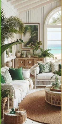 a living room with wicker furniture and tropical decor on the walls, along with palm trees