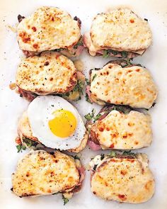 some food is laying out on a white plate and has an egg in the middle