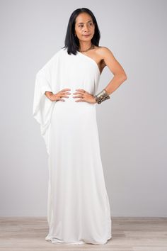 "Off white one shoulder dress,  Long off white dress, Off shoulder evening dress, white kaftan dress, white party dress, cocktail dress  FAST SHIPPING! PRODUCT SIZE : Free Size up to US 18 * Chest : 40\" will stretch to 44\" * Waist : 40\" will stretch to 44\" * Hips : 40\" will stretch to 44\" * Sleeve length : 23\" * Length : 56\" - 57\" from shoulder to hem (measured when laying flat) MATERIAL : * ITY (polyester jersey) > soft and comfortable to wear, not as slippery as spandex. * This is not White Party Dress Cocktail, White Dress Off Shoulder, White Kaftan Dress, White Party Dress, One Shoulder Dress Long, White Kaftan, Party Dress Cocktail, Off White Dress, Off Shoulder Evening Dress