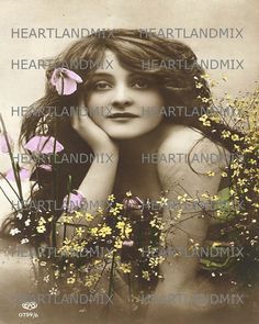 a woman with her hands on her face and flowers in front of her, surrounded by the words heartmix