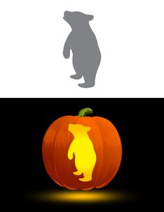 the silhouette of a bear and a pumpkin