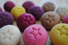 some colorful cookies with stars on them