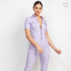 A Skinny Leg Jumpsuit Solid Color Basic Collar Short Sleeve Two Chest Flap Pockets Button Down And Zip Up Closure Cinched Waist Belt Loops Full-Length Jumpsuit Pockets 70% Rayon 25% Nylon And 5% Spandex Available In Ice Lavender Fitted Purple Jumpsuits And Rompers Overall, Spring Lavender Fitted Jumpsuits And Rompers, Fitted Lavender Jumpsuits For Spring, Fitted Purple Jumpsuits And Rompers For Spring, Summer Purple Jumpsuits And Rompers For Work, Purple Jumpsuits And Rompers For Summer Workwear, Purple Summer Jumpsuits And Rompers For Work, Chic Purple Jumpsuits And Rompers For Work, Trendy Fitted Button-up Jumpsuits And Rompers