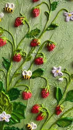 a painting of flowers and bees on a green surface