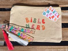 a small bag with the words bible nerd on it