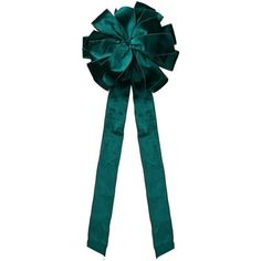 a green ribbon with a large bow on the front and back of it's head