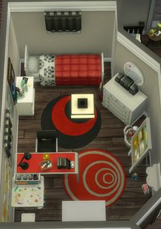 an overhead view of a living room and bedroom in a small apartment with red accents