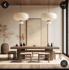 an image of a dining room setting with wood flooring and white lanterns hanging from the ceiling