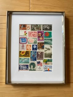 a box with some stamps in it on a table