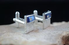 This is the perfect option for those who like cool, unique jewelry and the luxury, shine of gold and silver tone. This cufflinks are well made, cute and/or elegant in design, and very desirable. The tops have engraving . The one of cuff links are decorated with blue stones and white cz. The clasps are in perfect working condition. ♥ Age/era: Circa 1970s - 1980s. ♥ There is no hallmark. ♥ The cufflinks are about 7/8 inches by 9/16 inches, and 5/8'' by 2/4''. Every one interested in the jewelry sh Link Art, Blue Stones, Deco Vintage, Blue Decor, Cuff Links, Blue Stone, Gold And Silver, Silver Gold, Cufflinks