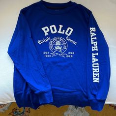 Polo Ralph Lauren Boys Rugby Crest Long Sleeve Cotton Tee. Brand New, Washed But Never Worn. Soft Cotton, My Son Never Wore This Because He’d Always Grab For His Sports Tees Instead Boys Size 6. Purchased Direct From Ralph Lauren. Long Sleeve School Shirt With Graphic Print, Long Sleeve Graphic Print School Shirt, Blue Letter Print Top For School, Blue Letter Print Tops For School, Blue Long Sleeve T-shirt For School, Casual Ralph Lauren Tops With Letter Print, Ralph Lauren Casual Tops With Letter Print, Blue Ralph Lauren Cotton Tops, Blue Long Sleeve Shirt With Letter Print