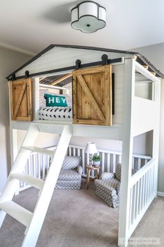 a loft bed with wooden shutters and stairs