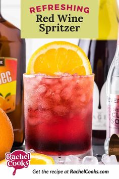 a red wine spritzer with oranges and ice