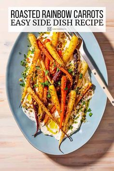 roasted rainbow carrots are served on top of mashed potatoes and parmesan cheese