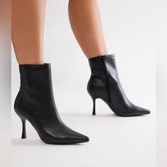 Introducing Our Latest Addition To Your Fall Wardrobe - The Black Pu Pointy Low Heel Bootie! Made With High-Quality Faux Leather, This Versatile Bootie Provides Comfort And Style. Perfect For Any Occasion, It's A Must-Have Staple Piece For The Upcoming Season. Upgrade Your Look With Our New Bootie! Material: Man Made Pu Leatherette 3 1/2" Heel Height 7 1/2" Shaft Height 10 3/8" Open Circumference Inner Side Zipper Women's High Heel Booties Tags: Black Boot, Black Bootie, Ankle Boots, Fall Boots, Ankle Boots Fall, Fall Staple Pieces, Black Pointed Toe Heels, Pointy Boots, Fall Boots, Trendy Boots, Pointed Toe Boots, Pointed Toe Heels, Boots Fall